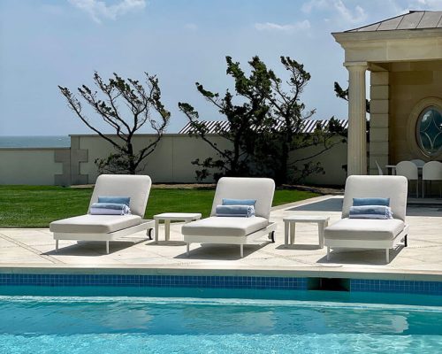Luxury oceanfront residence designed by The Decorator’s Dream and furnished by Portside Luxury featuring pieces by Vondom.