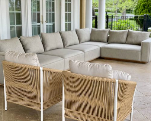 Luxury summer home designed & furnished by Portside Luxury featuring pieces by Harbour Outdoor and Point 1920.