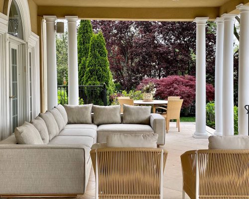 Luxury summer home designed & furnished by Portside Luxury featuring pieces by Harbour Outdoor and Point 1920.