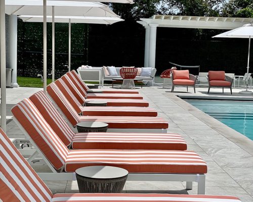 Luxury summer home designed by Valerie Betesh and furnished by Portside Luxury featuring pieces by Point 1920 & Tuuci.