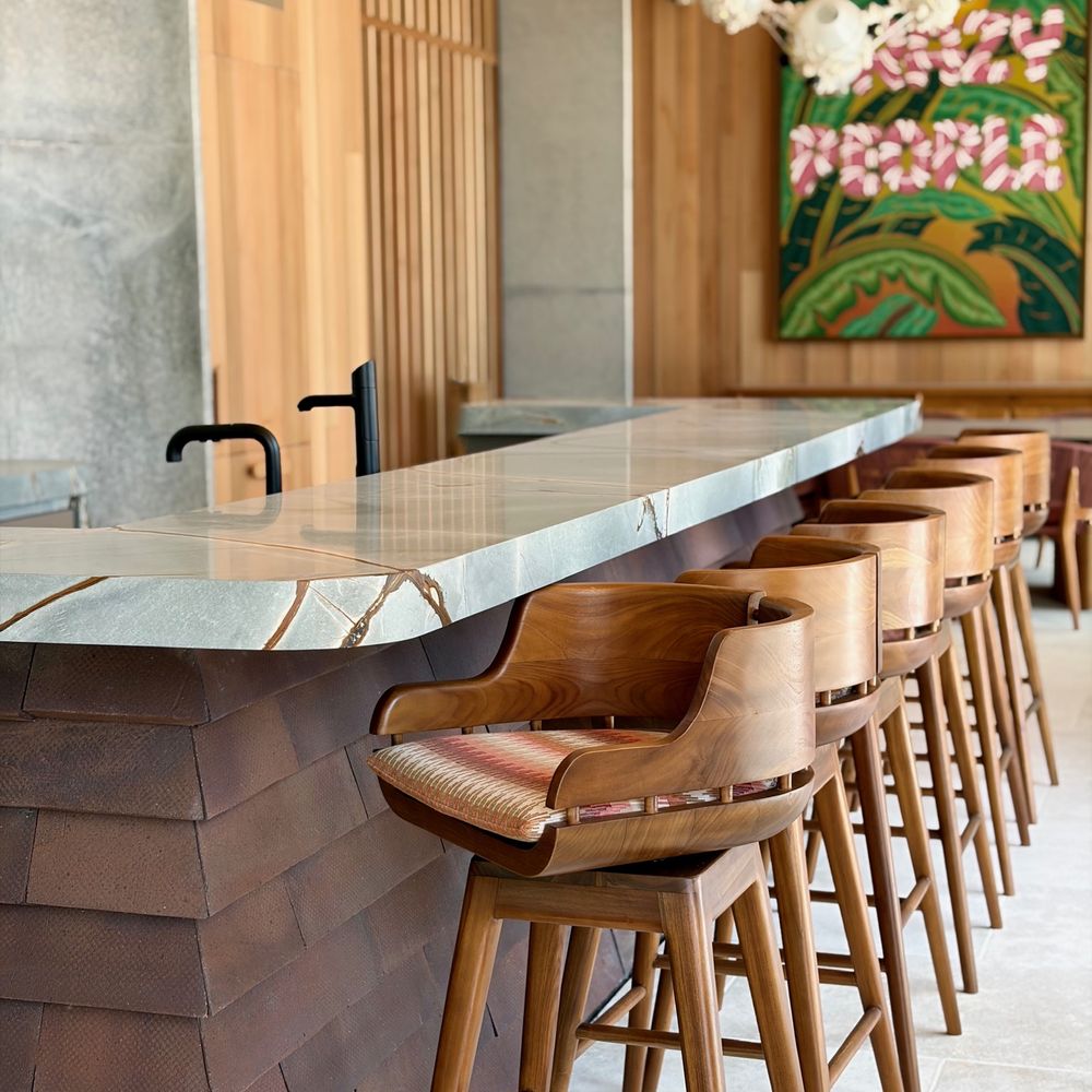 Outdoor Bar. Counter stools along the stone bar.