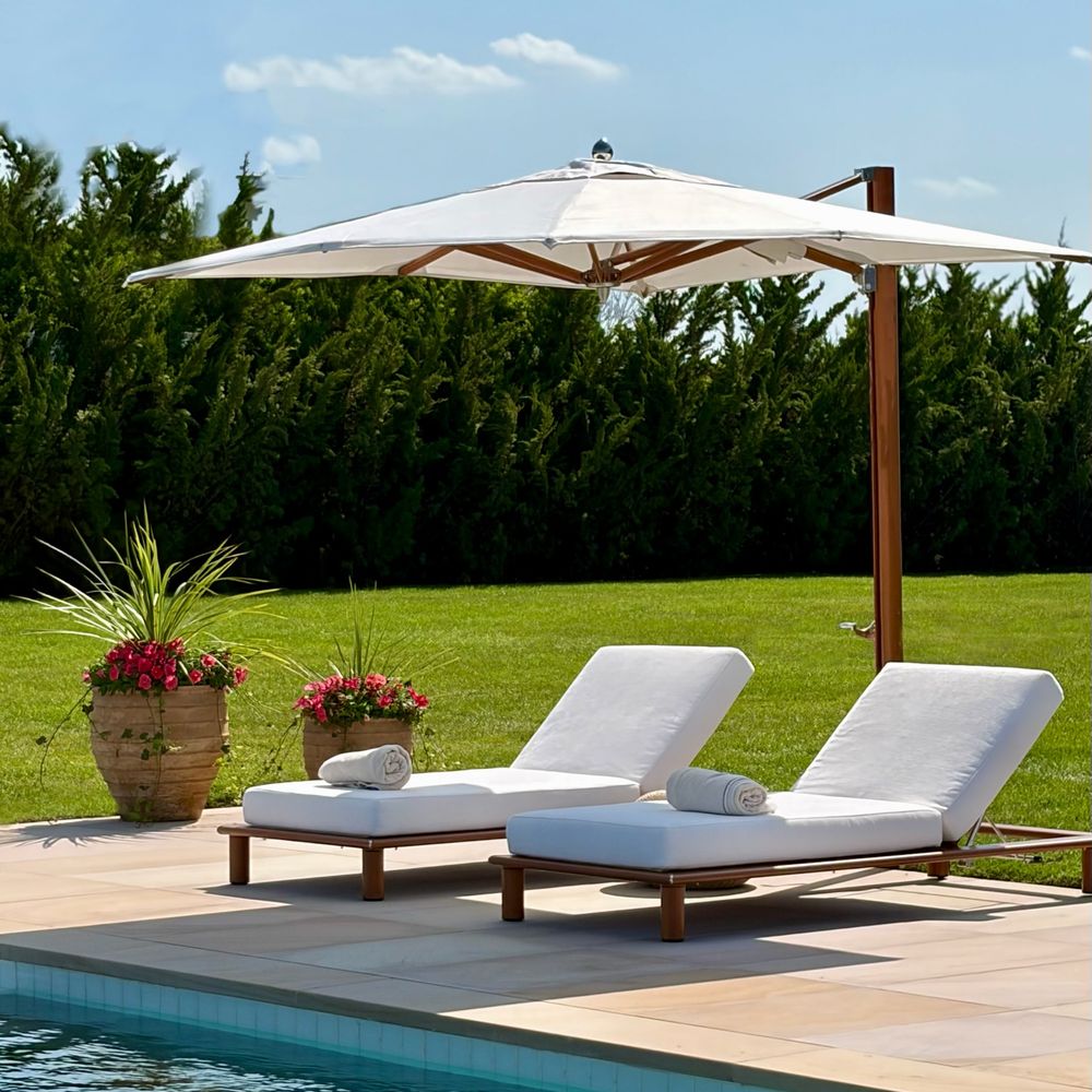 Poolside Chaises. Twin chaises under the parasol.