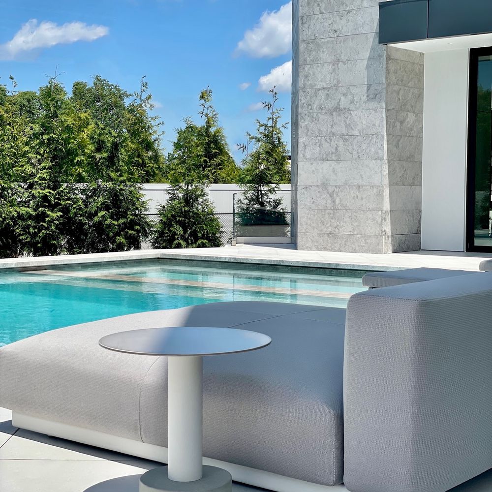 Poolside Daybed. A wide daybed beside the pool.